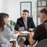 Dallas homeowners speak with a property tax consultant